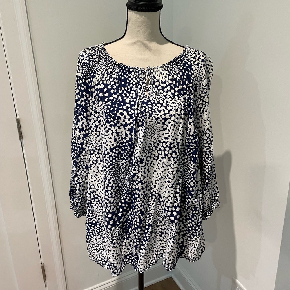 Talbots floral print blouse with smocked neckline and pinhole closure at neck